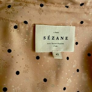 100% pink & black polka dot silk blouse from Sezane